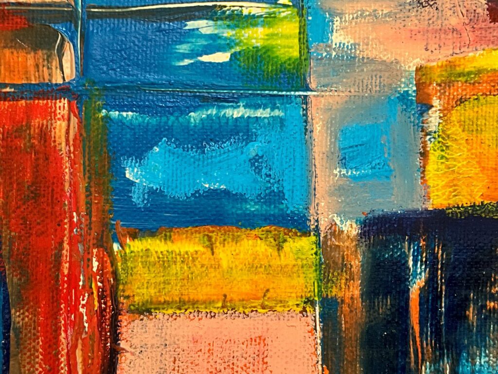 Dynamic abstract painting featuring bold colors and rich textures, showcasing artistic brushstrokes.
